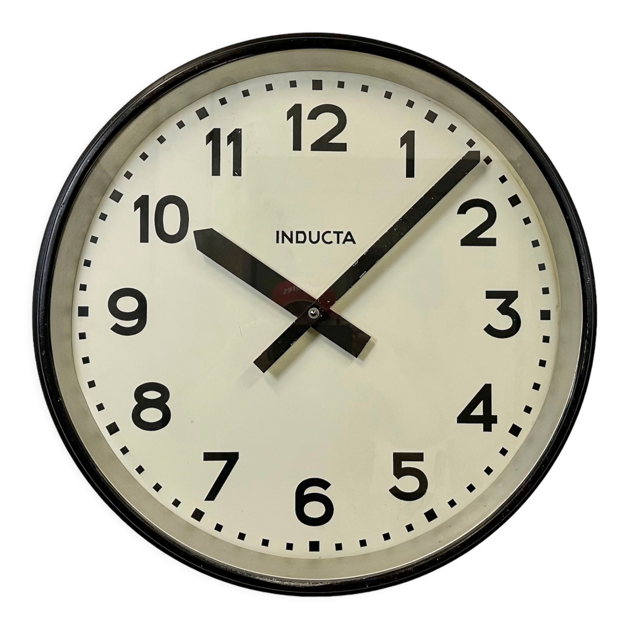 Black swiss industrial wall clock from inducta, 1960s