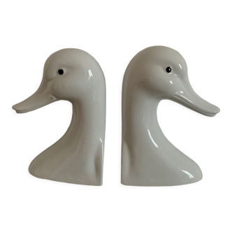 Vintage bookends in the shape of a goose or ceramic duck