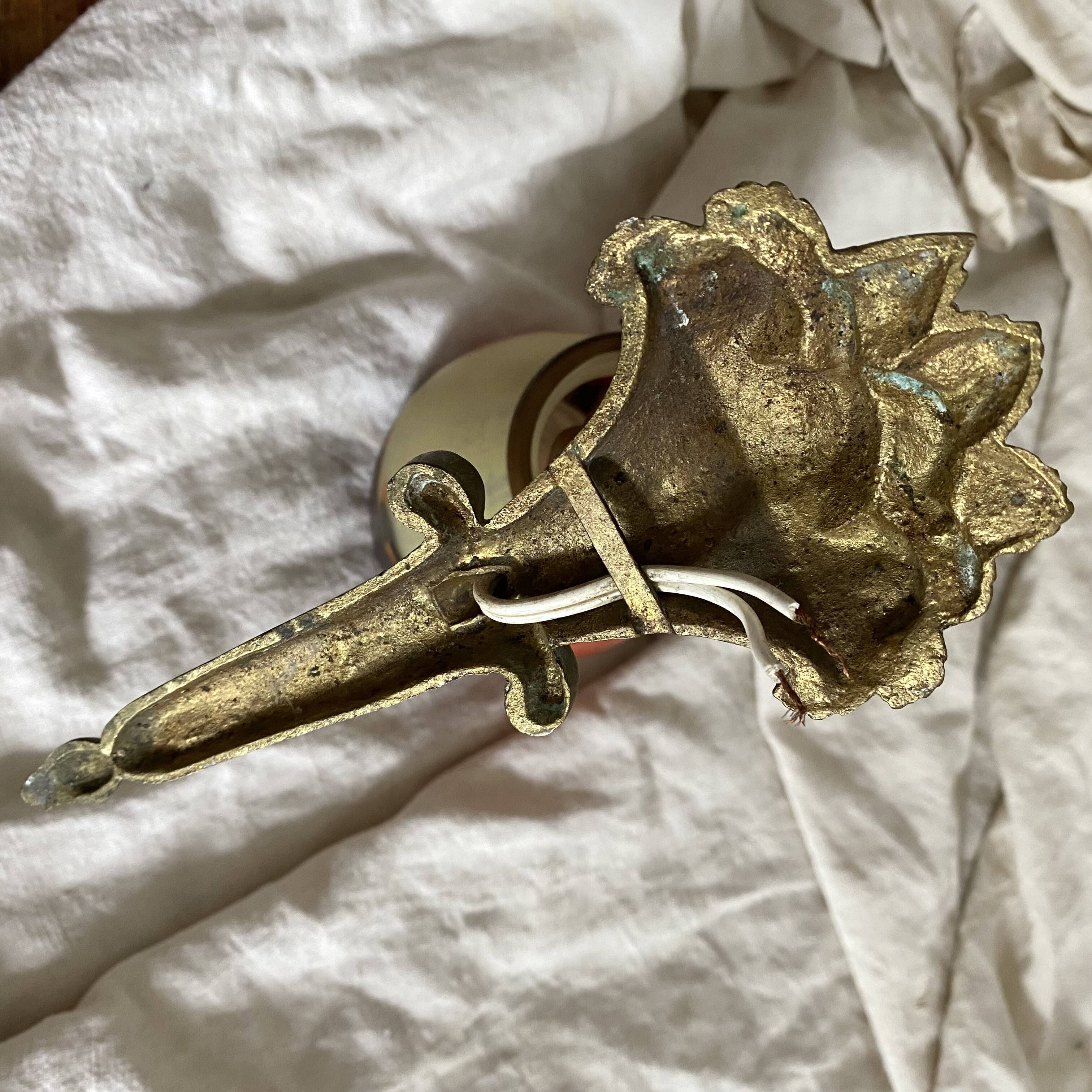 Antique bronze and glass paste wall light