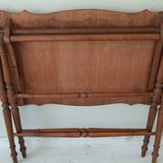 Vintage folding table with turned legs.