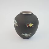 Small black ceramic vase with abstract fish and wave pattern