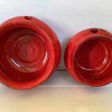 Pair of red Scandinavian candle holders.