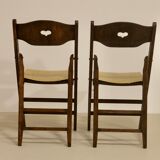 Pair of vintage folding chairs year 50 sculpted backrest.