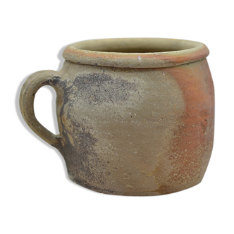 Ancient terracotta pot with handle
