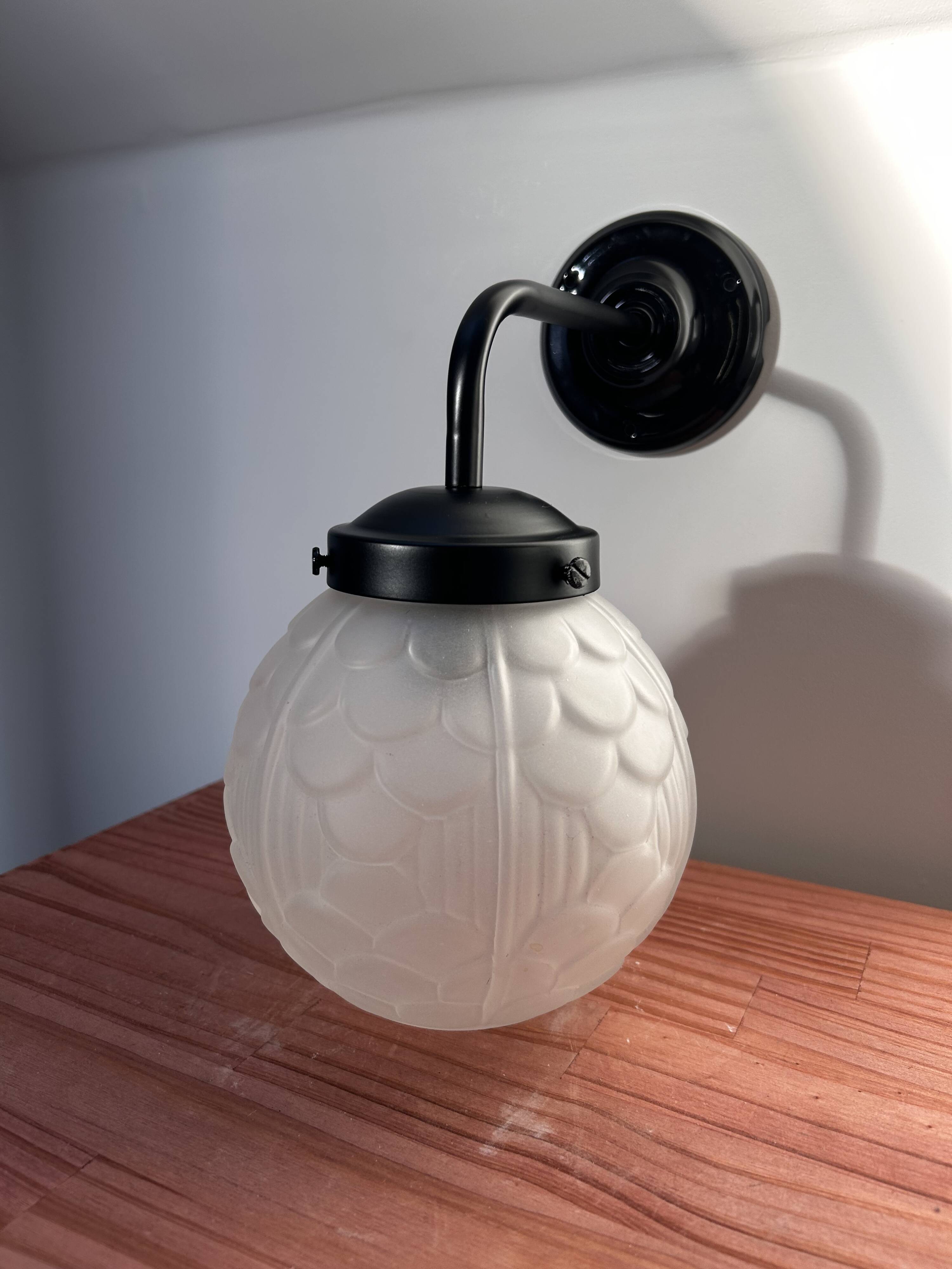 Black art deco wall light