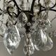 Antique cage chandelier with rock crystal pendants