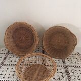 Three natural wicker baskets