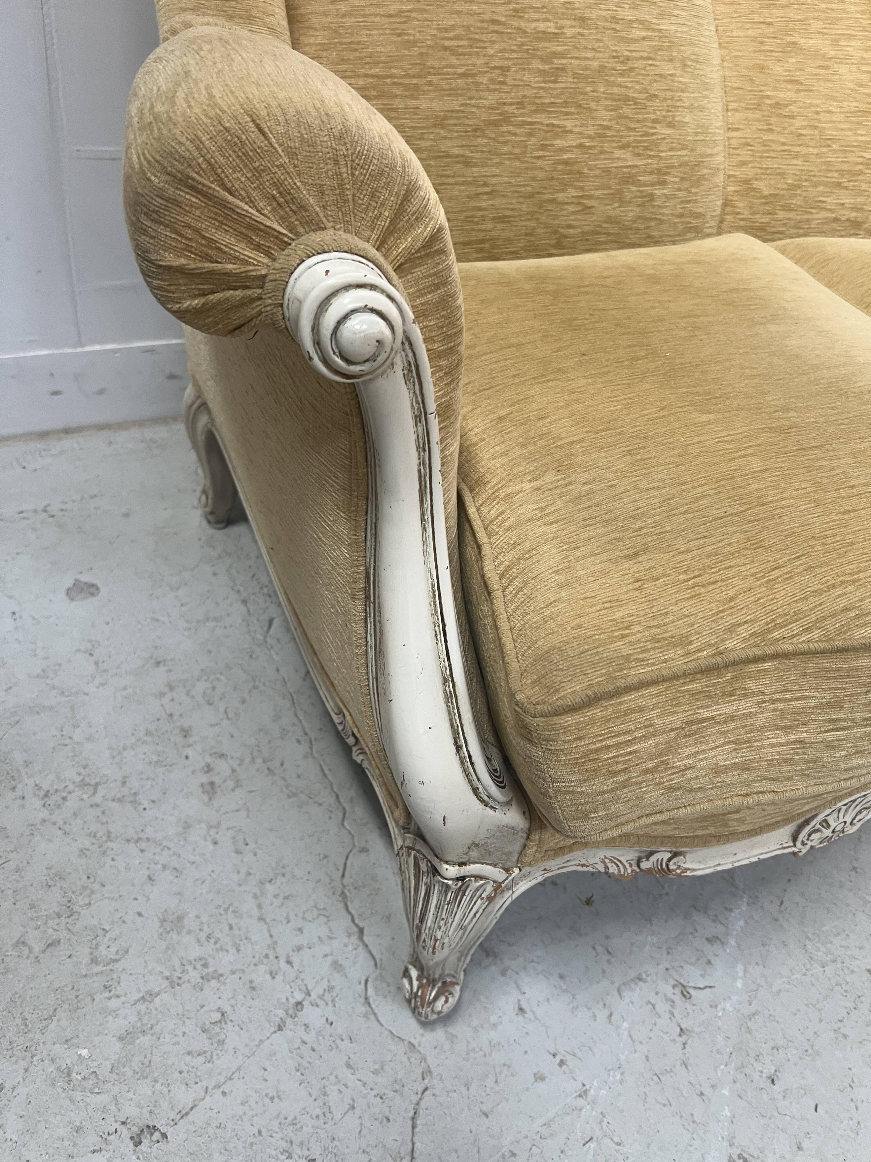 Louis XV style three-seater wingback sofa in patinated beech, 20th century