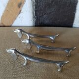 Series of 6 door metal knife dog