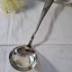 SOH silver metal ladle with shell/foliage decor