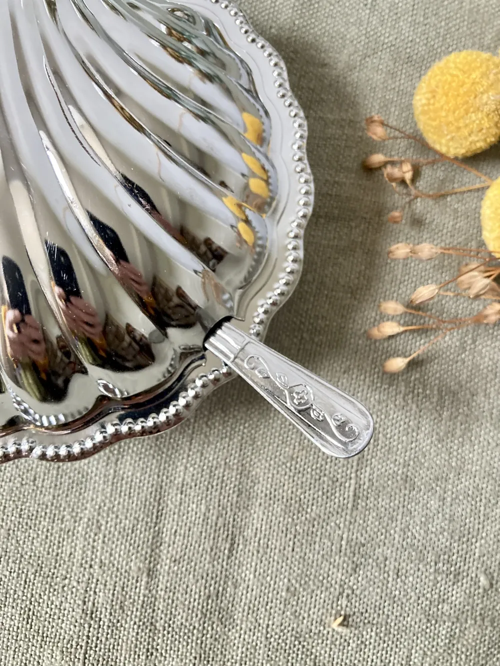 Metal shell butter dish with glass bowl and knife