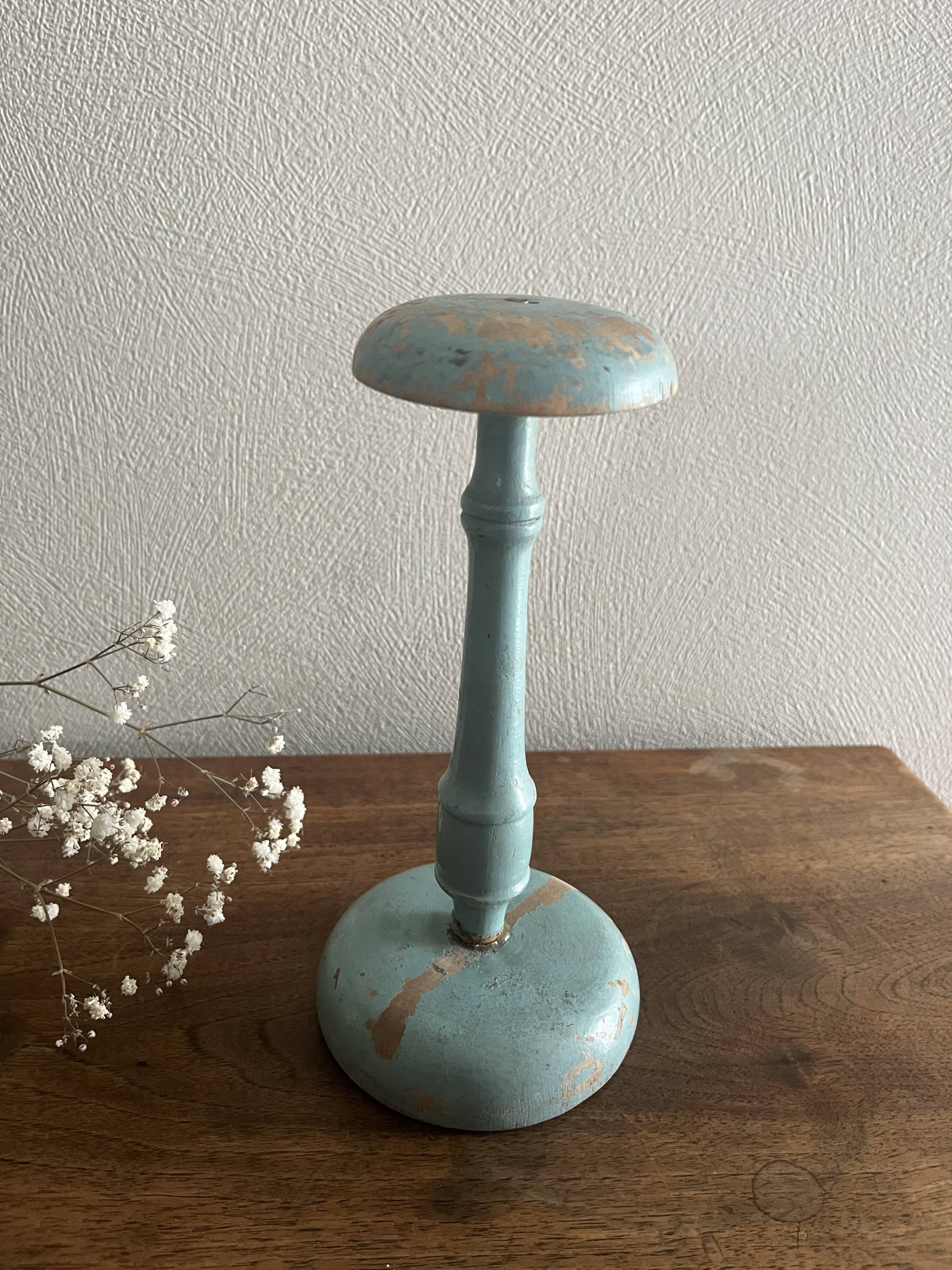 Weathered wooden hat rack