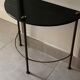 Half-moon console in glass and brass