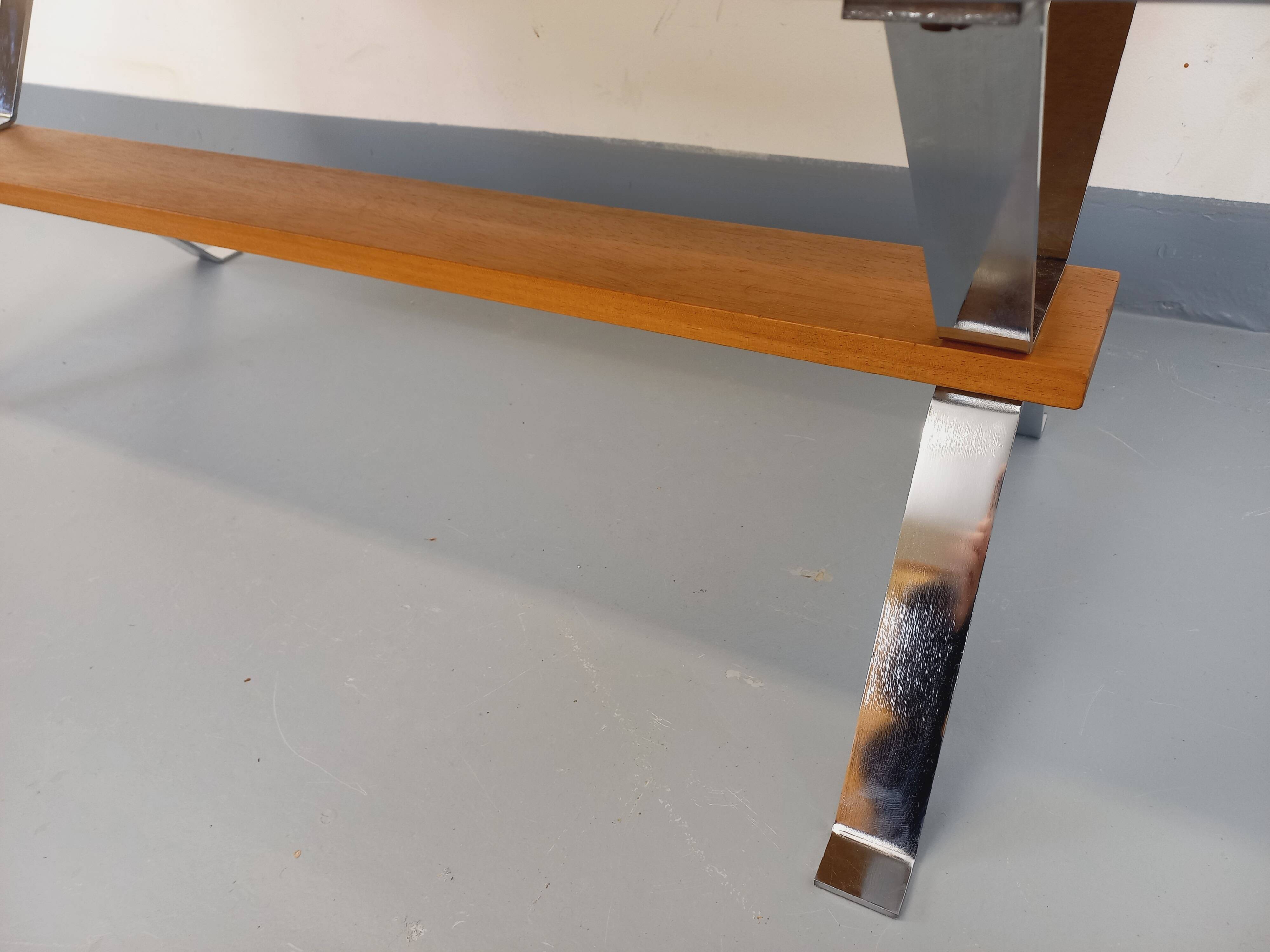 Vintage coffee table from the 60s and 70s in ceramic, chrome metal, and wood.