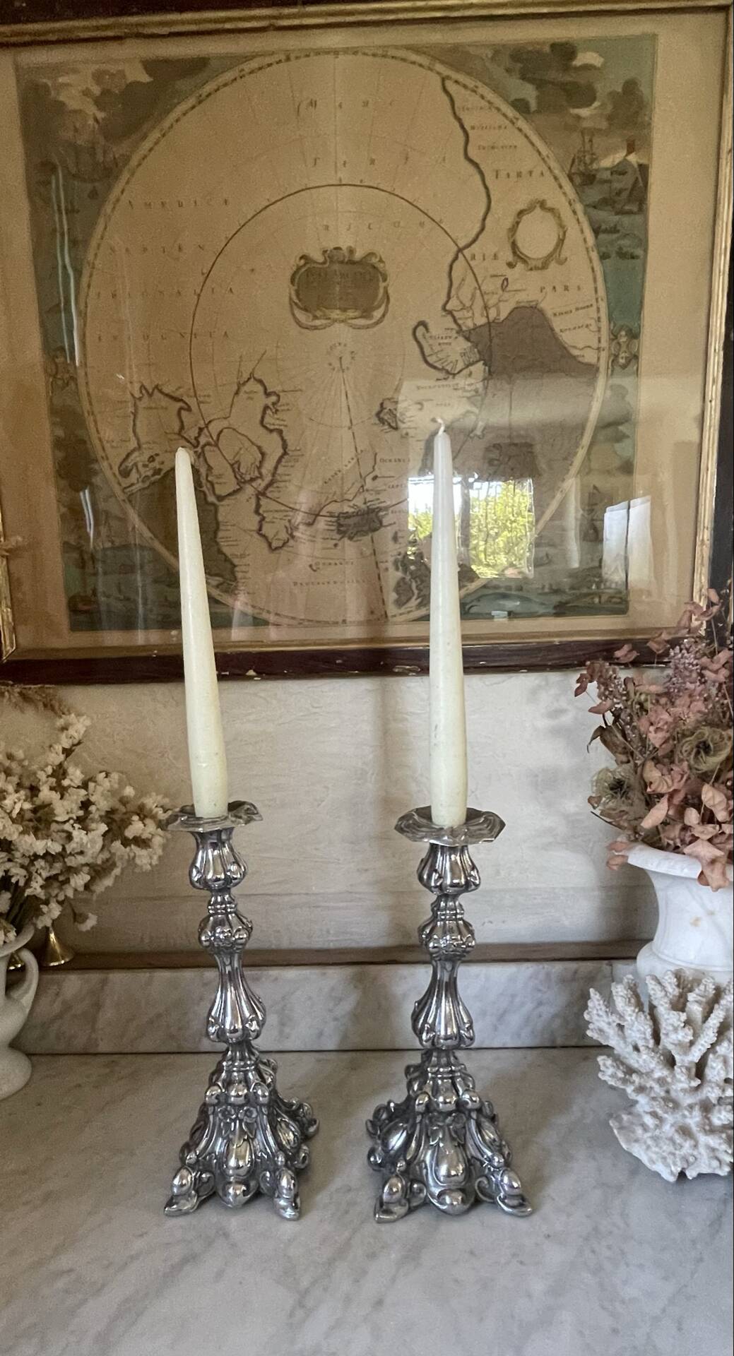 Pair of rococo silver-plated candlesticks