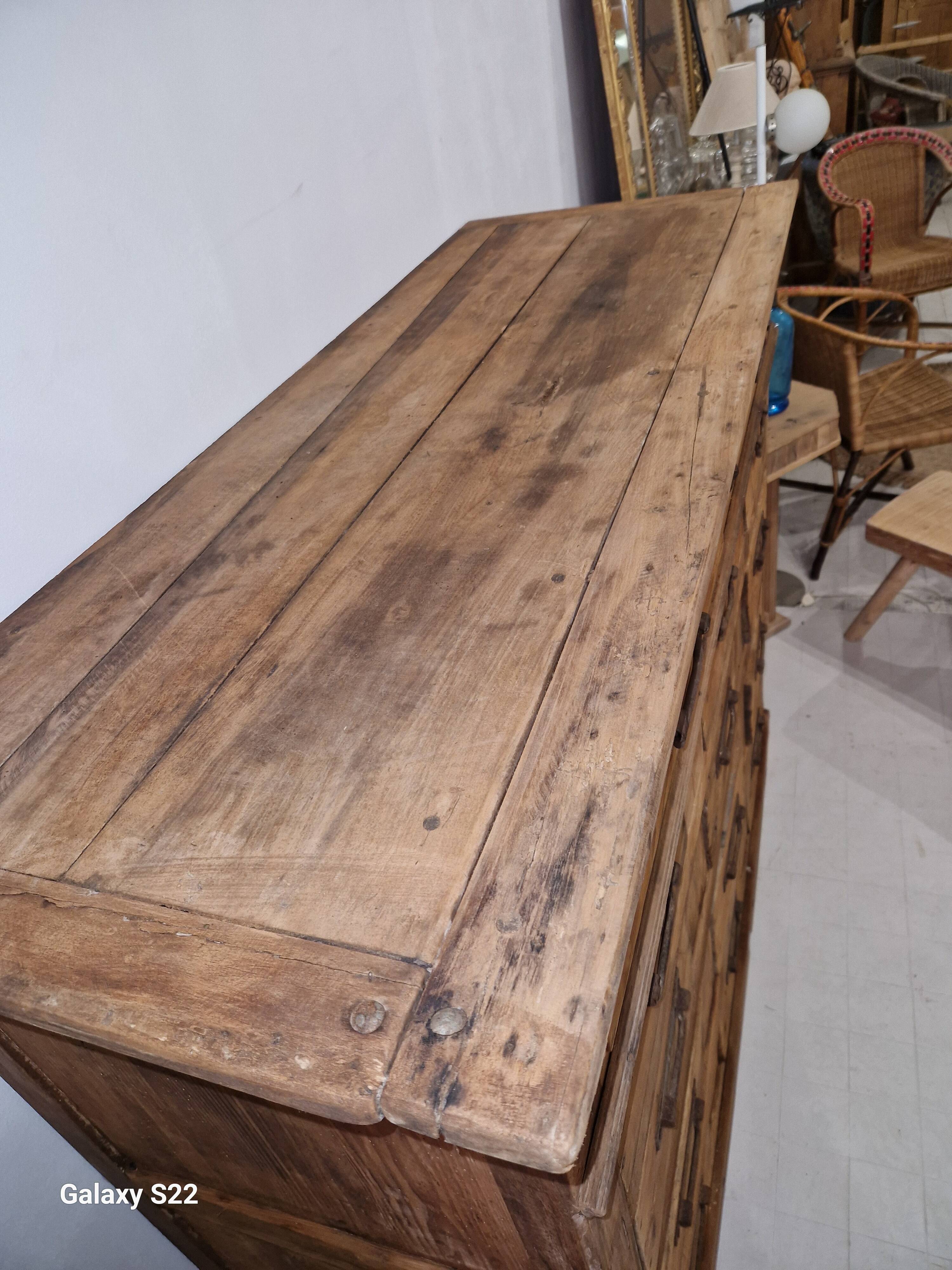 14-drawer wooden chest of drawers