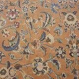 Large wool and silk oriental carpet.