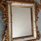 Antique gilded wooden mirror with mouldings, Louis XV style.