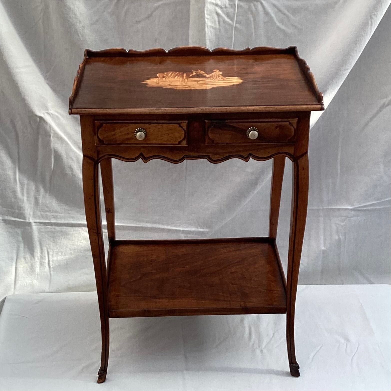 Old wooden side table with marquetry