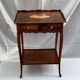 Old wooden side table with marquetry