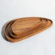 Trio de plateaux ou coupelles de forme triangulaire arrondi en teck monoxyle