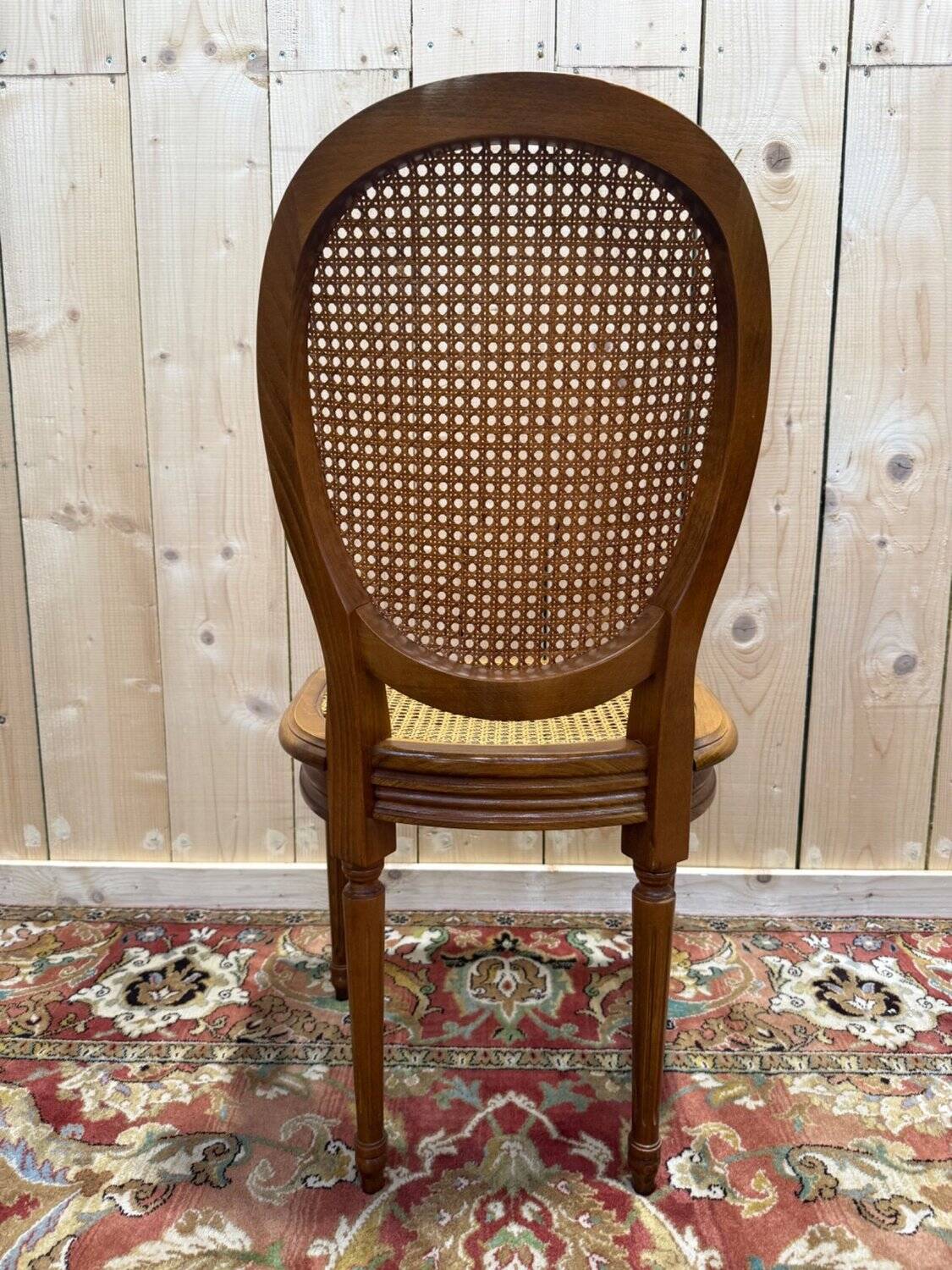 Set of 6 Louis XVI medallion chairs with caning.