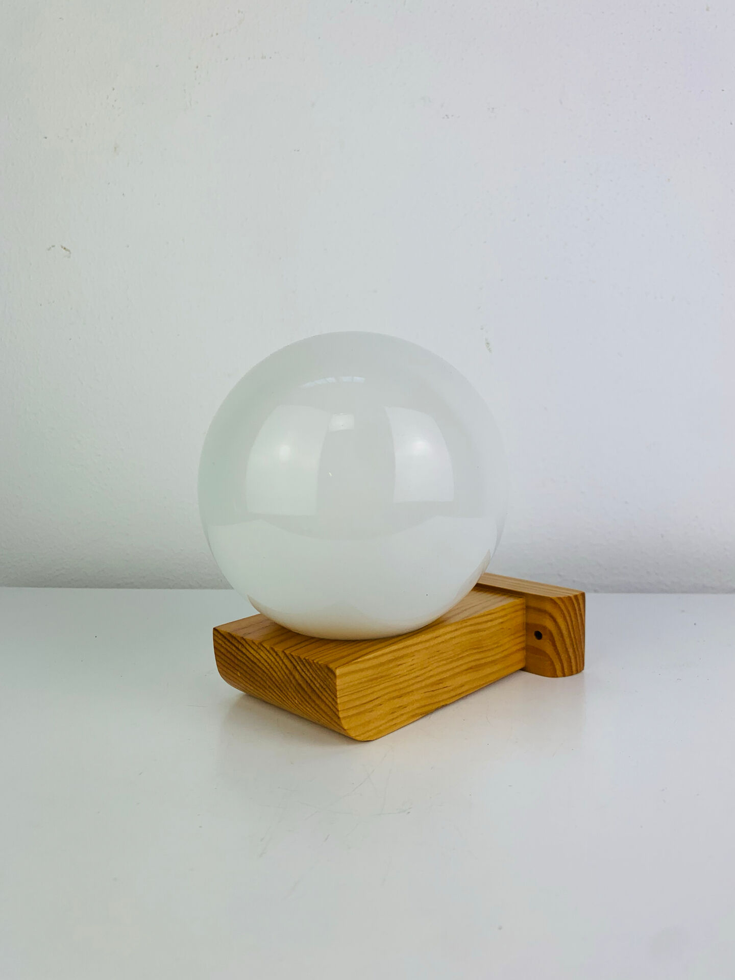 Vintage Tissot opaline globe and pin wall light.