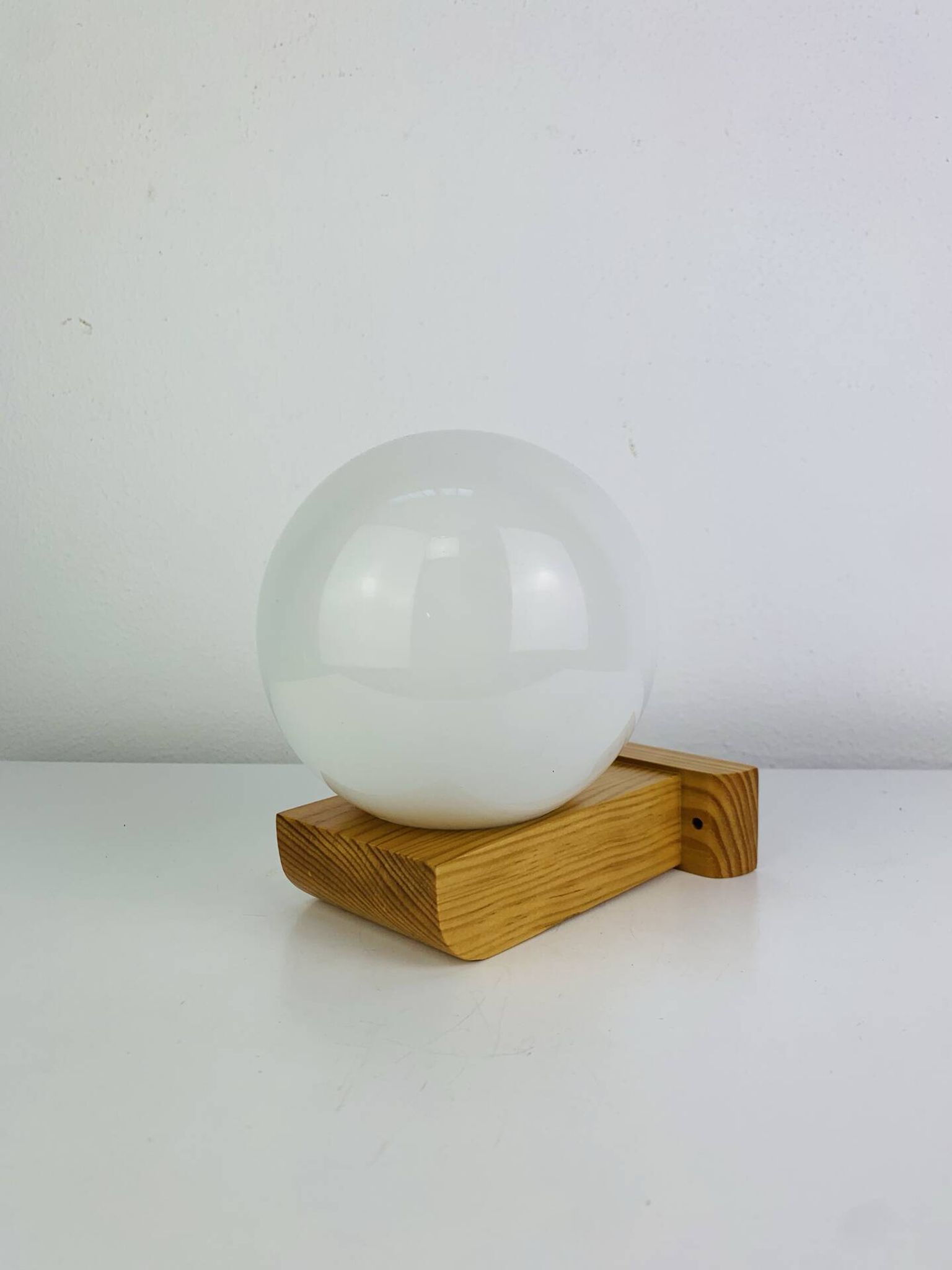 Vintage Tissot opaline globe and pin wall light.