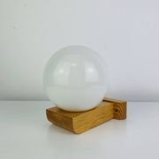 Vintage Tissot opaline globe and pin wall light.