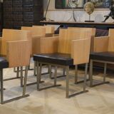 Set of 6 designer armchairs in oak and leather from the 1980s.