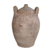Ancient sandstone jar with two handles