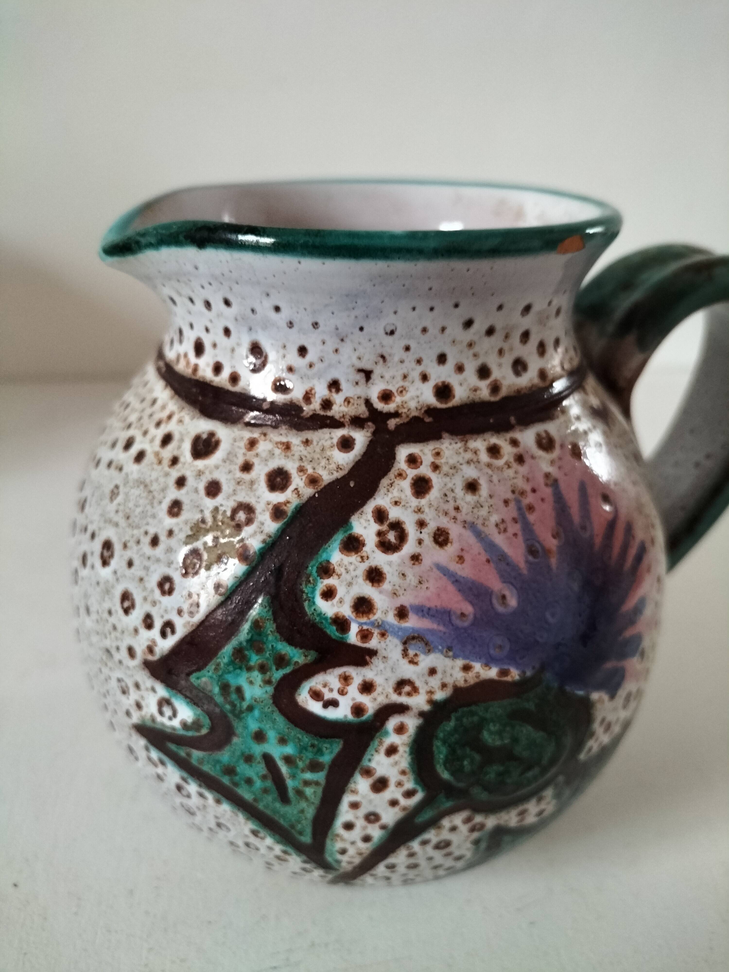 Pitcher with thistle motif by André Georges Pougues les Eaux