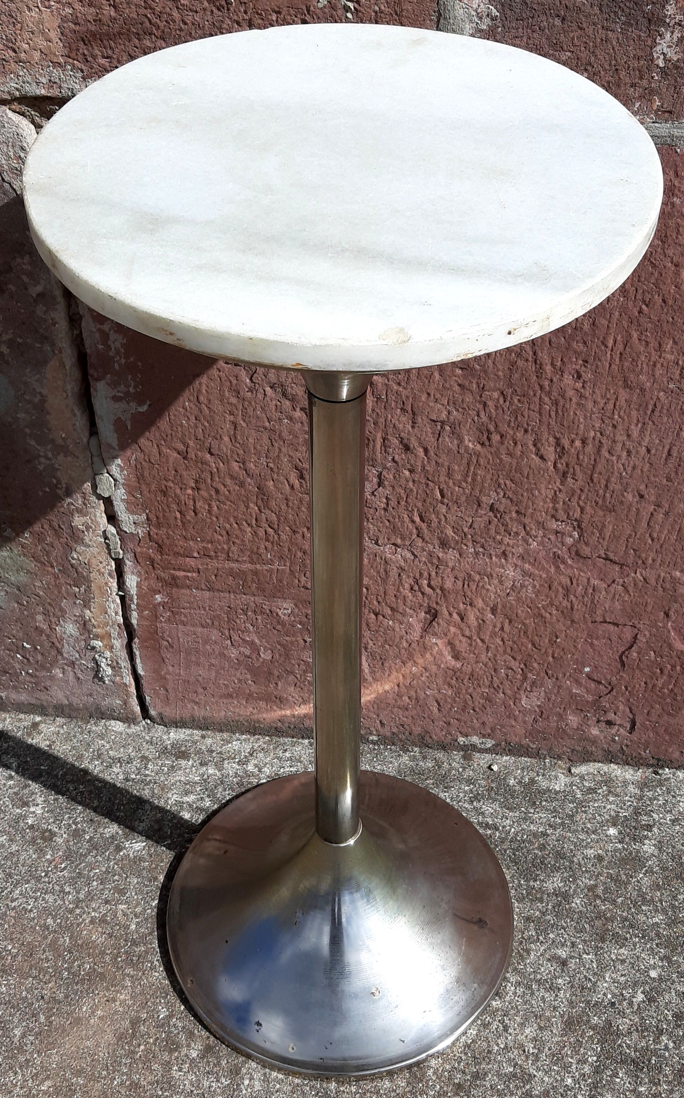 Golden metal selette on marble