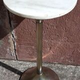 Golden metal selette on marble