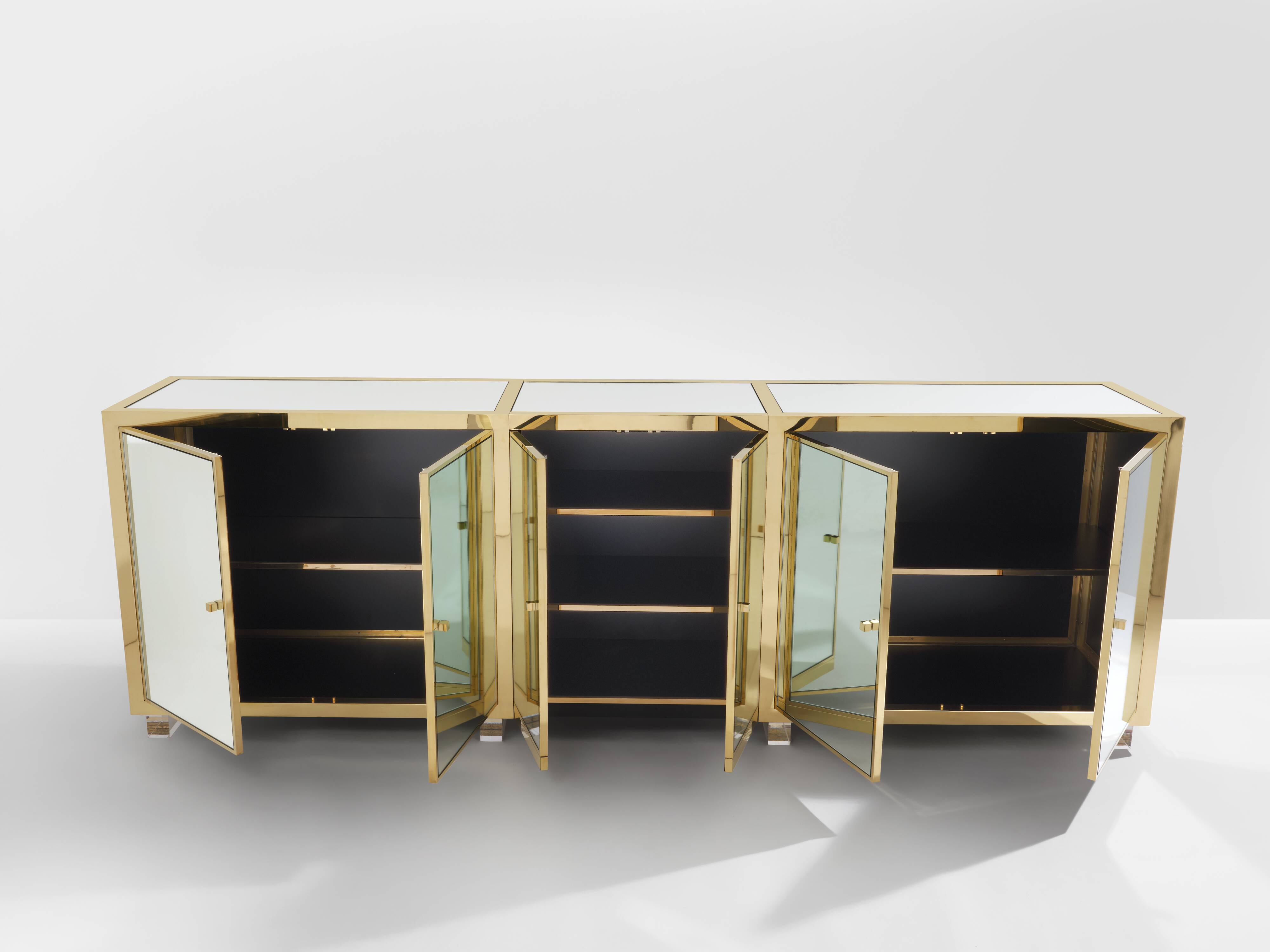 Brass sideboard with mirror and plexiglass legs by Michel Pigneres, 1970