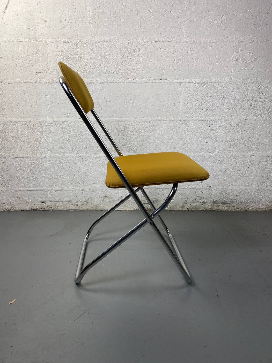 Mustard yellow folding chair