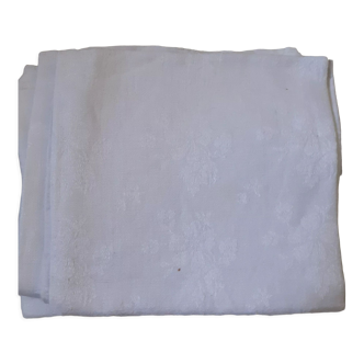 6 large white damask towels.