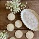Lot of mother-of-pearl aperitif items, 7 coasters and a dish.