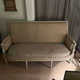 Antique Directoire style sofa in wood and fabric