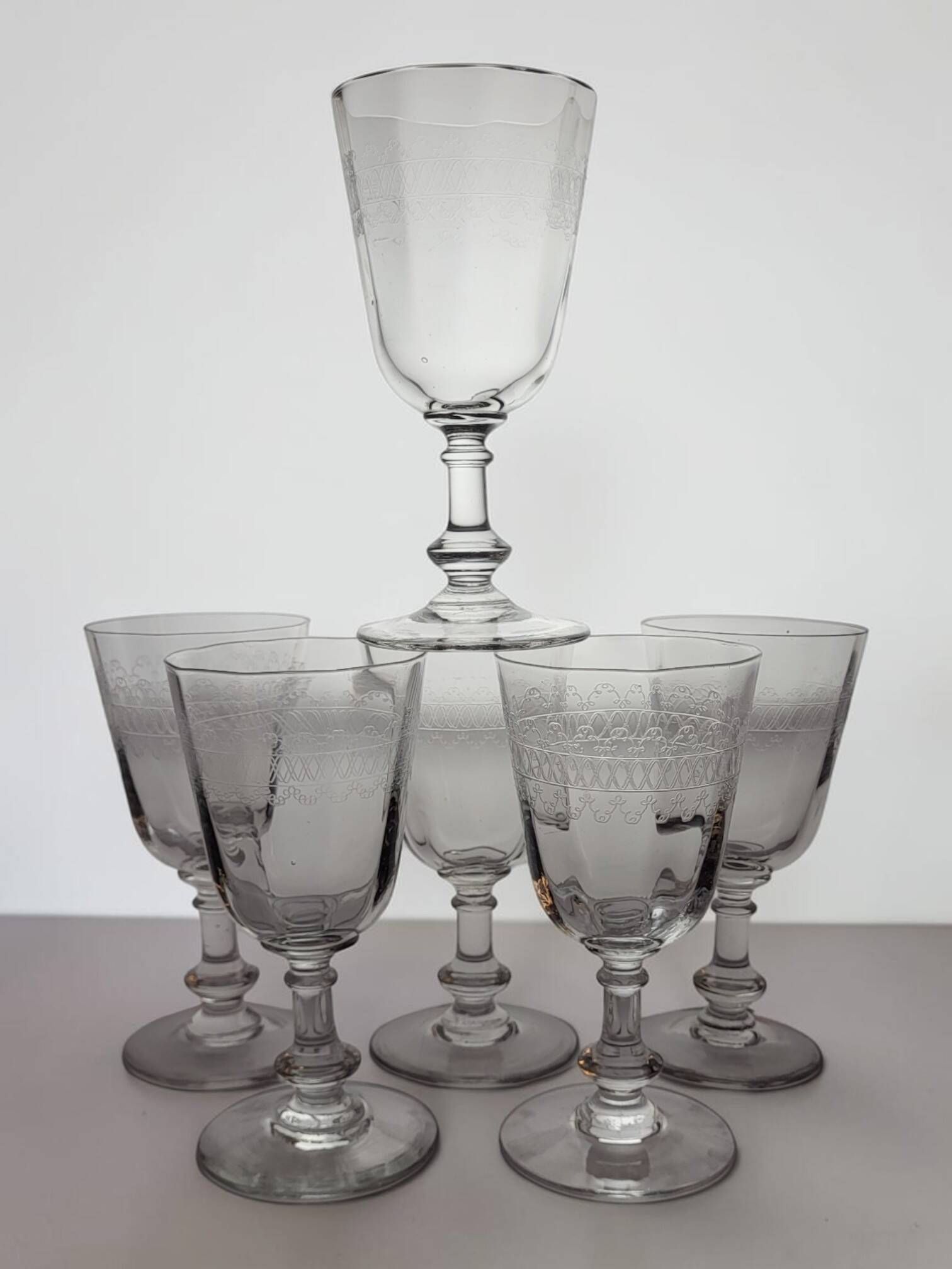 6 engraved glass wine/water glasses from the early 20th century.