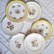 Old mismatched earthenware dessert plates