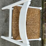 Vintage chair with wicker seat, minimalist design
