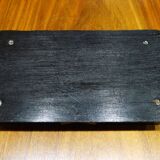 Old pen holder in black wood