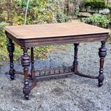 Table from the late 19th century, neo-Renaissance style, in black and oak.
