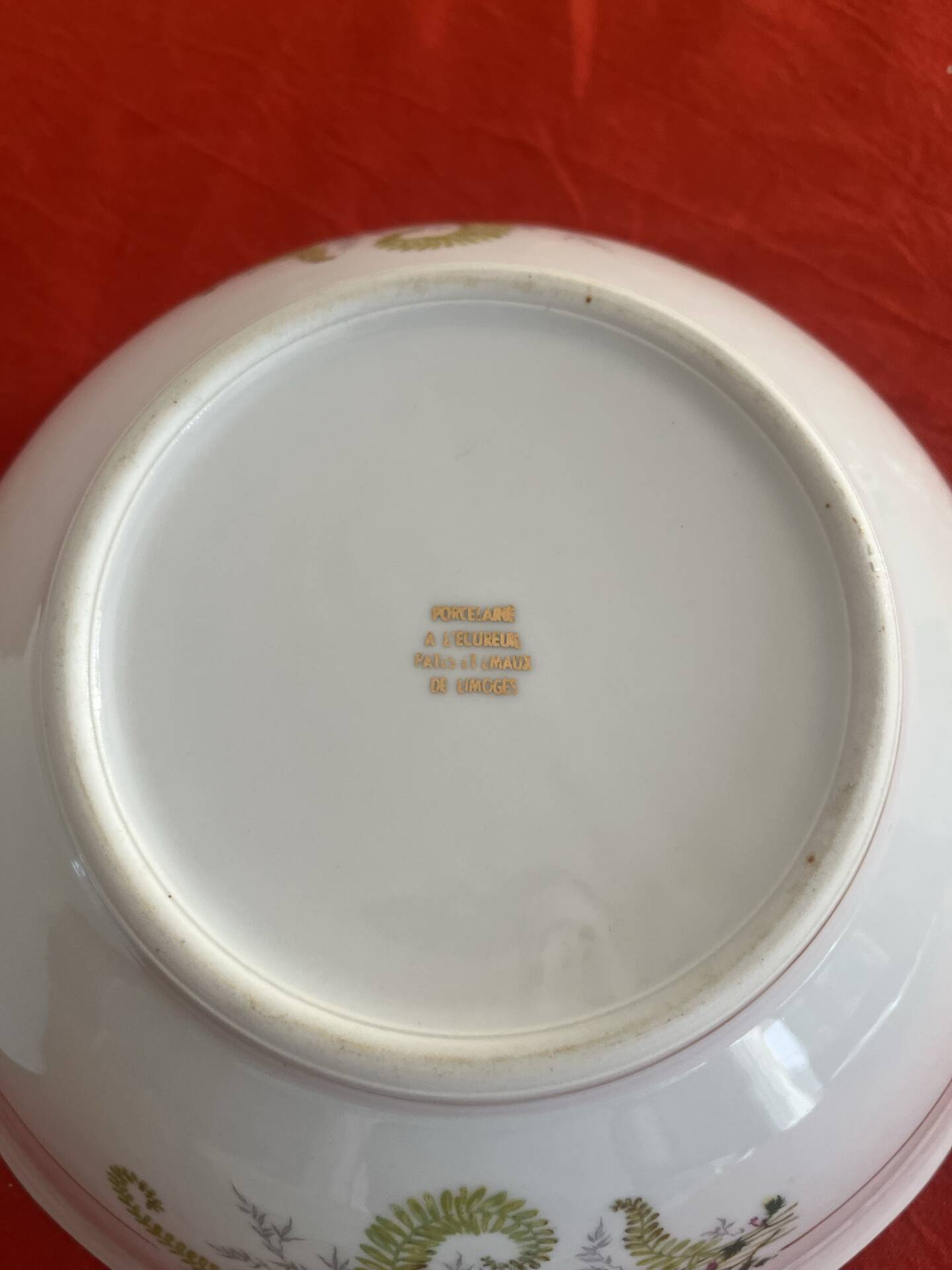 3 Limoges porcelain plates with a squirrel design.