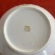 3 Limoges porcelain plates with a squirrel design.