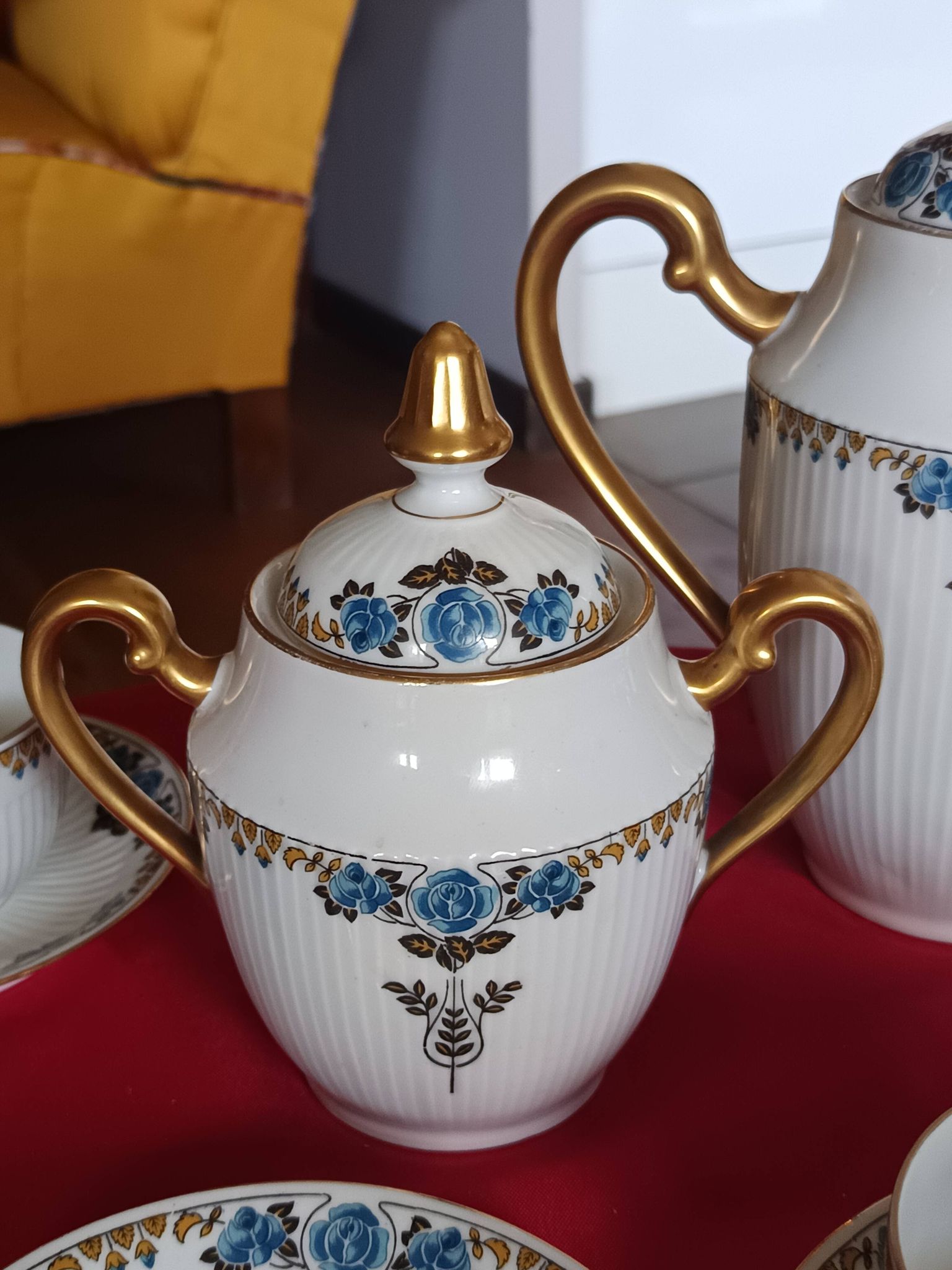 Antique Limoges porcelain coffee/tea service – 14 pieces with blue rose decoration.