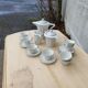 Coffee maker and cups