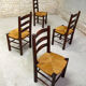 Series of 4 wooden chairs and straw
