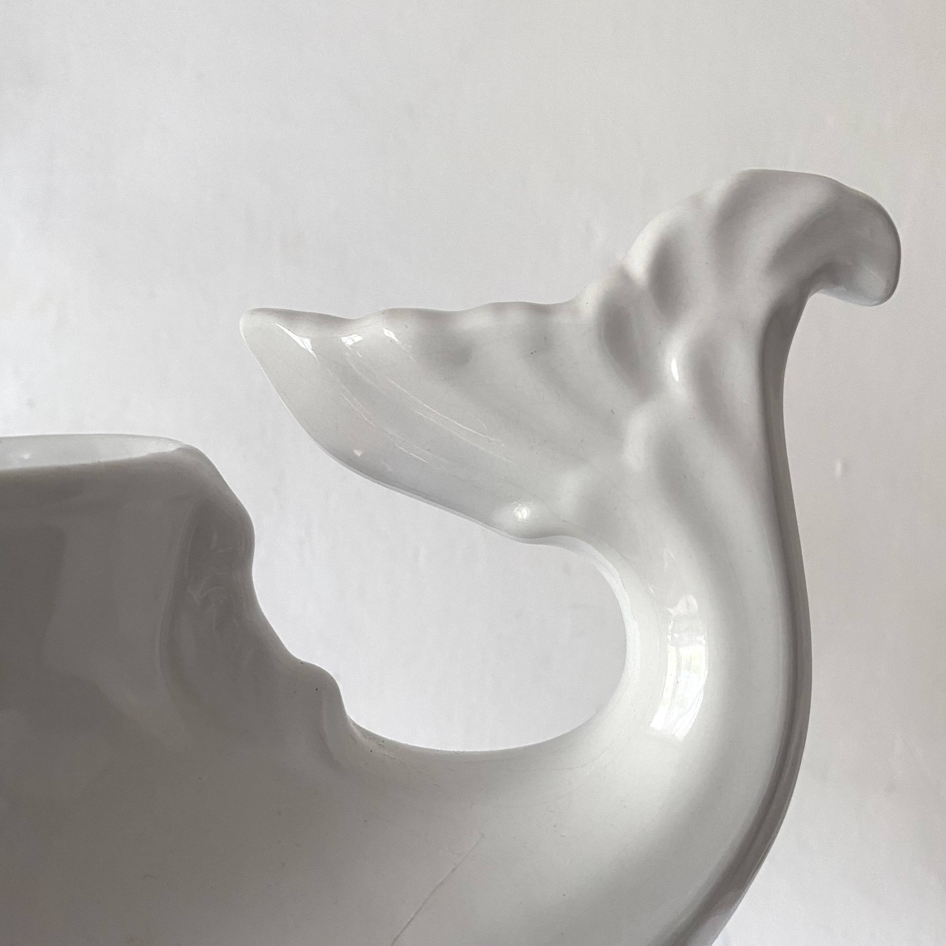 Zoomorphic fish pot cover in slip